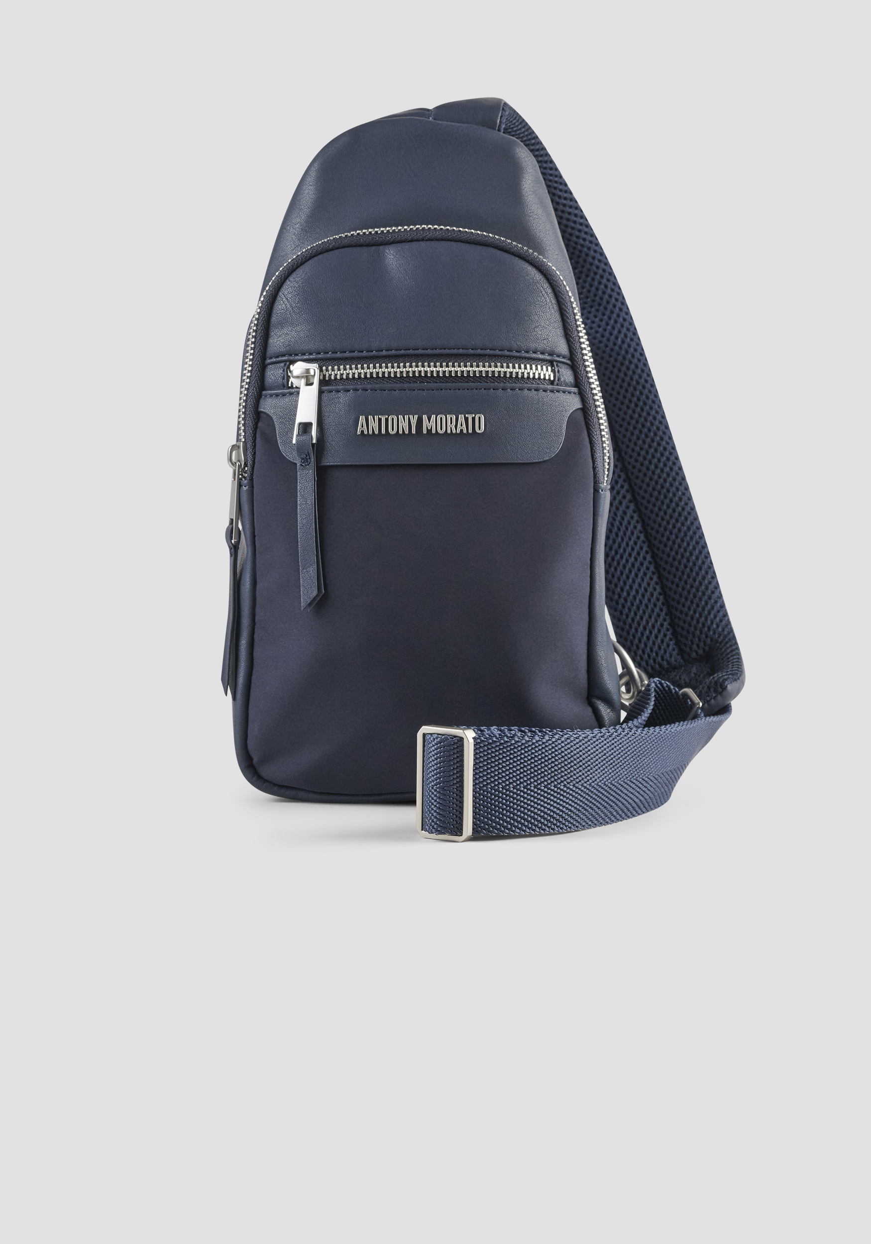 NYLON AND FAUX LEATHER SLING BACKPACK