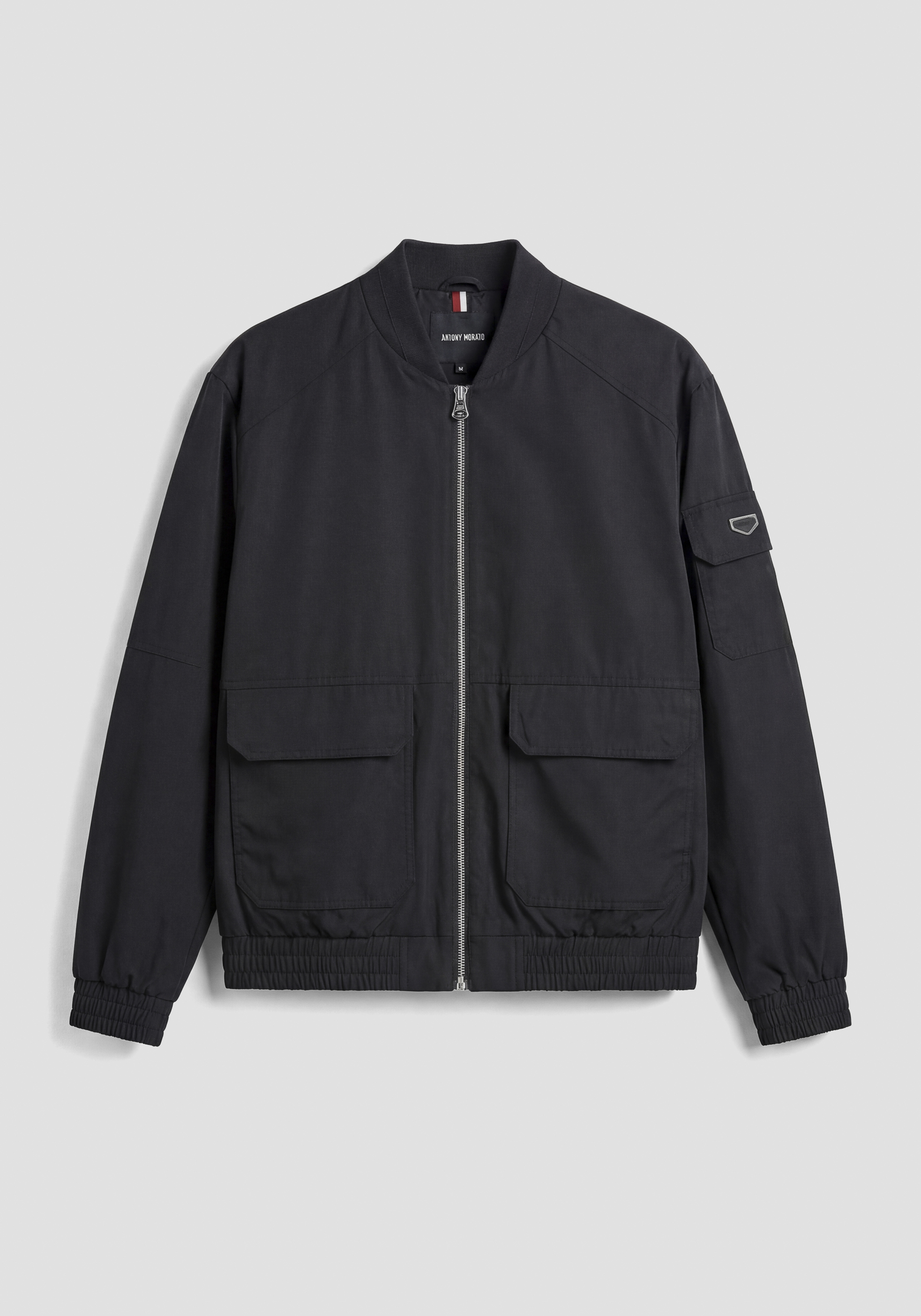 BÓMBER REGULAR FIT DE TEJIDO TÉCNICO LIGERO