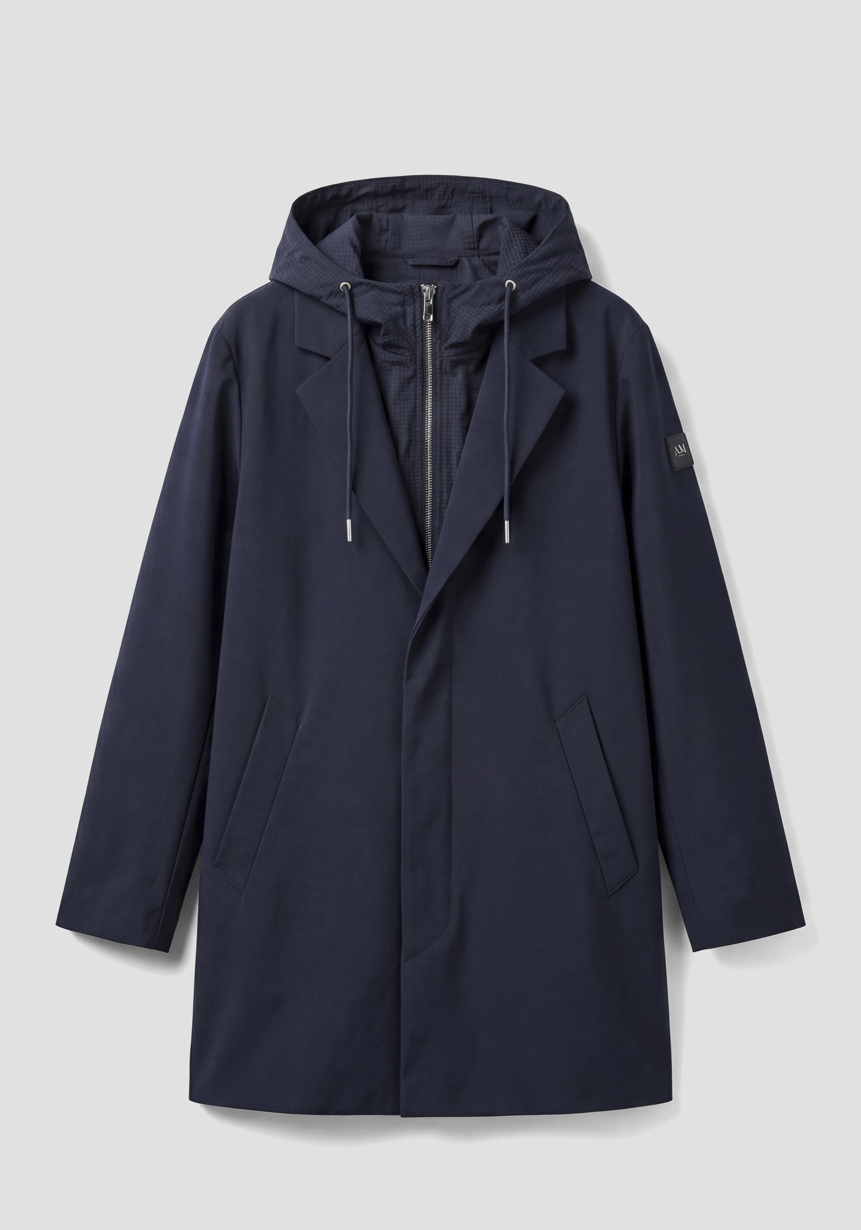 IMPERMEABLE REGULAR FIT DE TEJIDO TÉCNICO