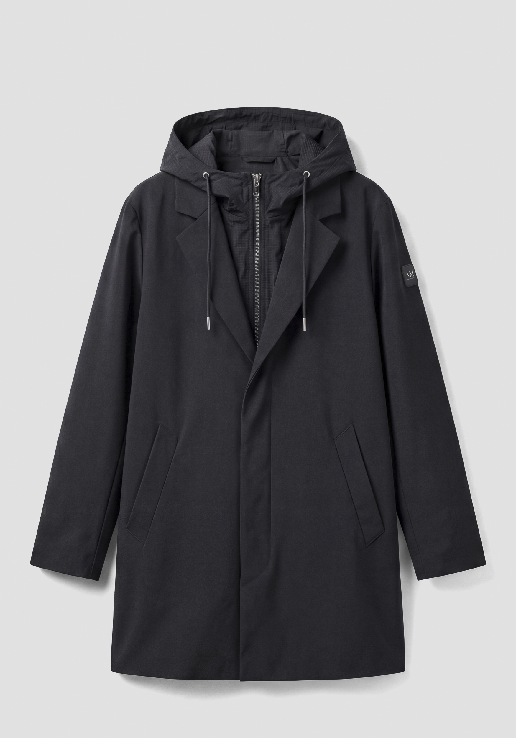 IMPERMEABLE REGULAR FIT DE TEJIDO TÉCNICO