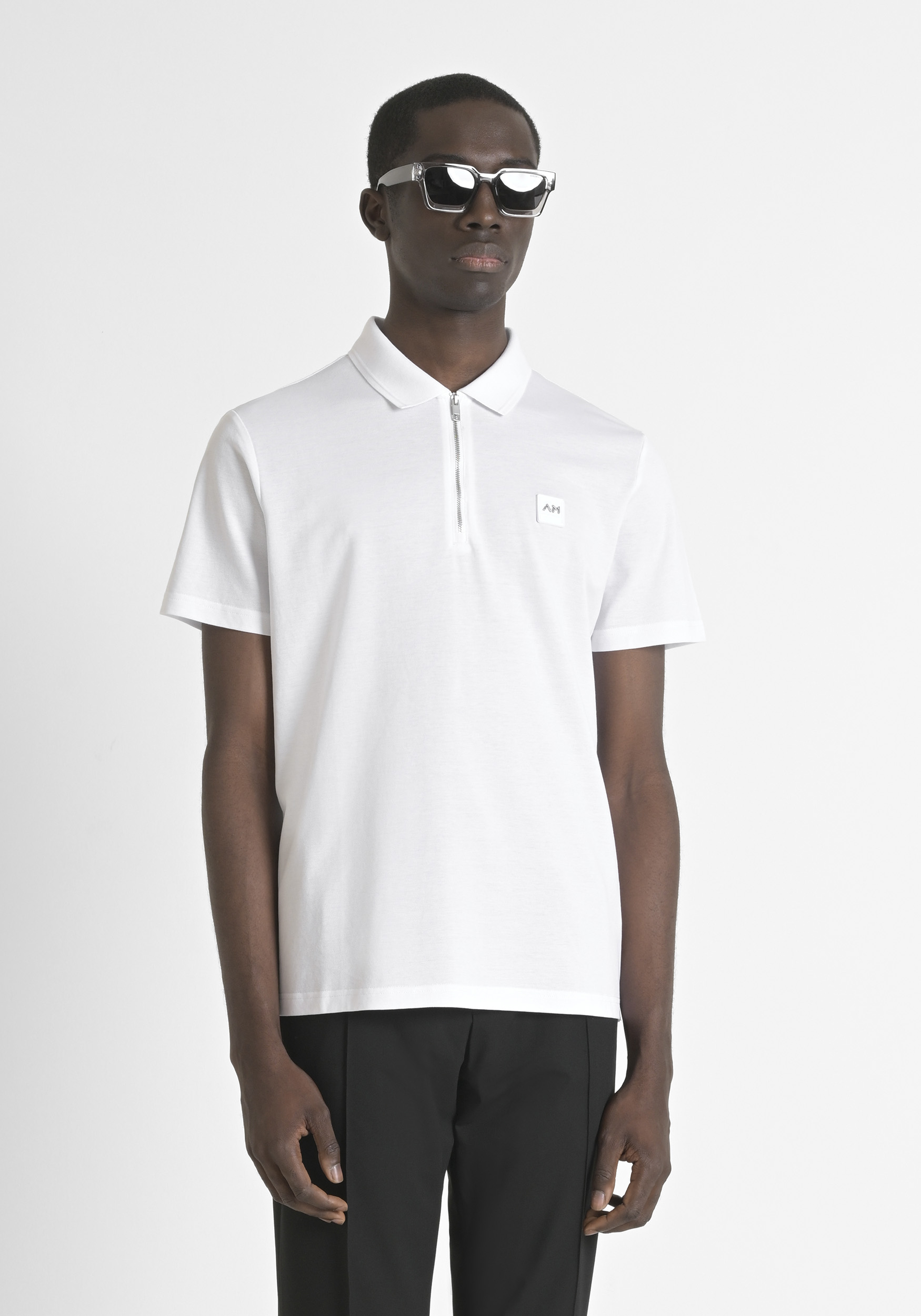 POLO REGULAR FIT IN PIQUET COTTON WITH METAL BADGE