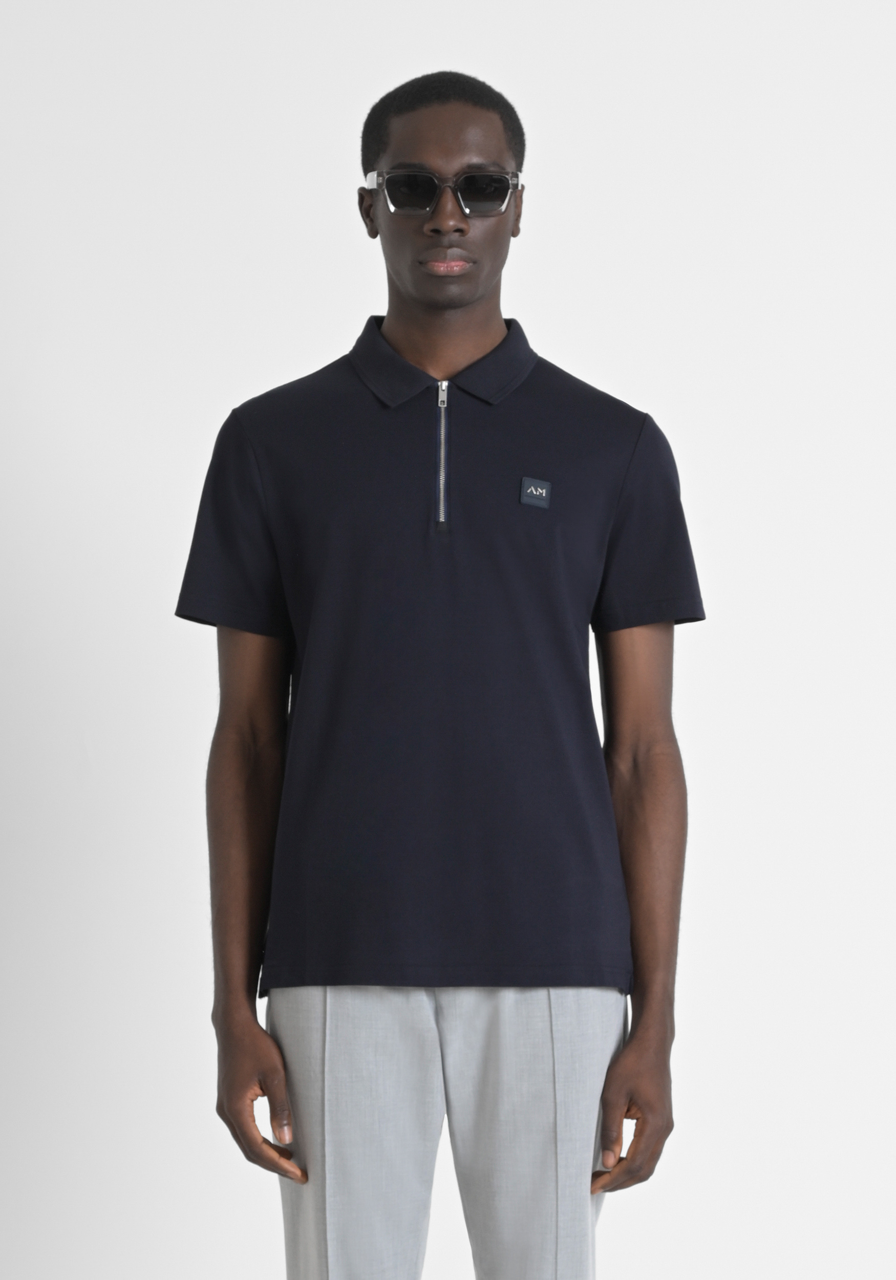 POLO REGULAR FIT IN PIQUET COTTON WITH METAL BADGE