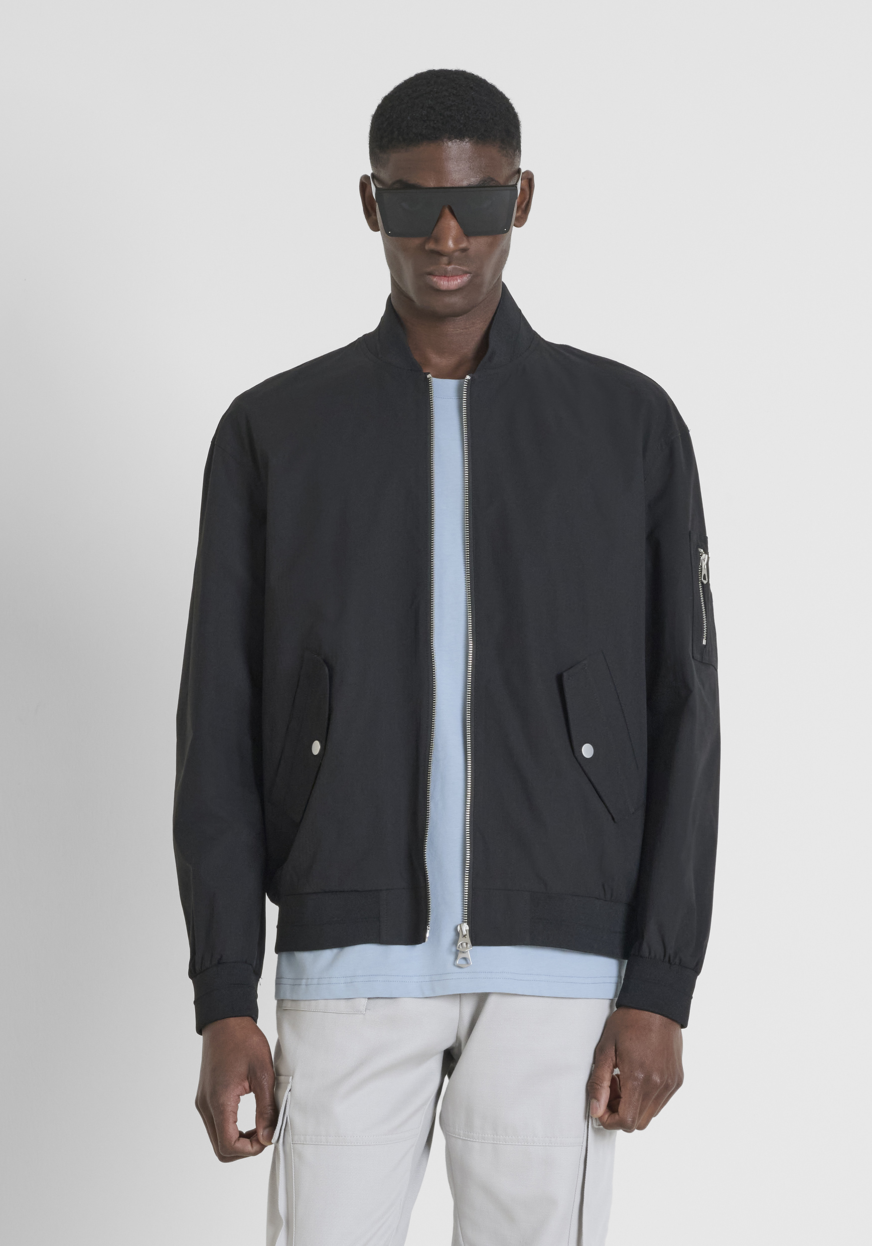 GIUBBOTTO REGULAR FIT IN TESSUTO RIBSTOP CON LOGO IN METALLO