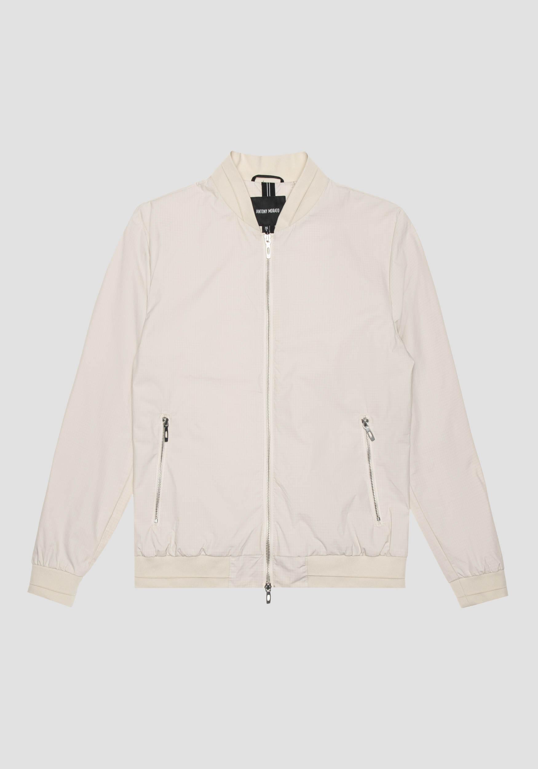 CHAQUETA REGULAR FIT DE NAILON RIPSTOP CON PLACA CON LOGOTIPO