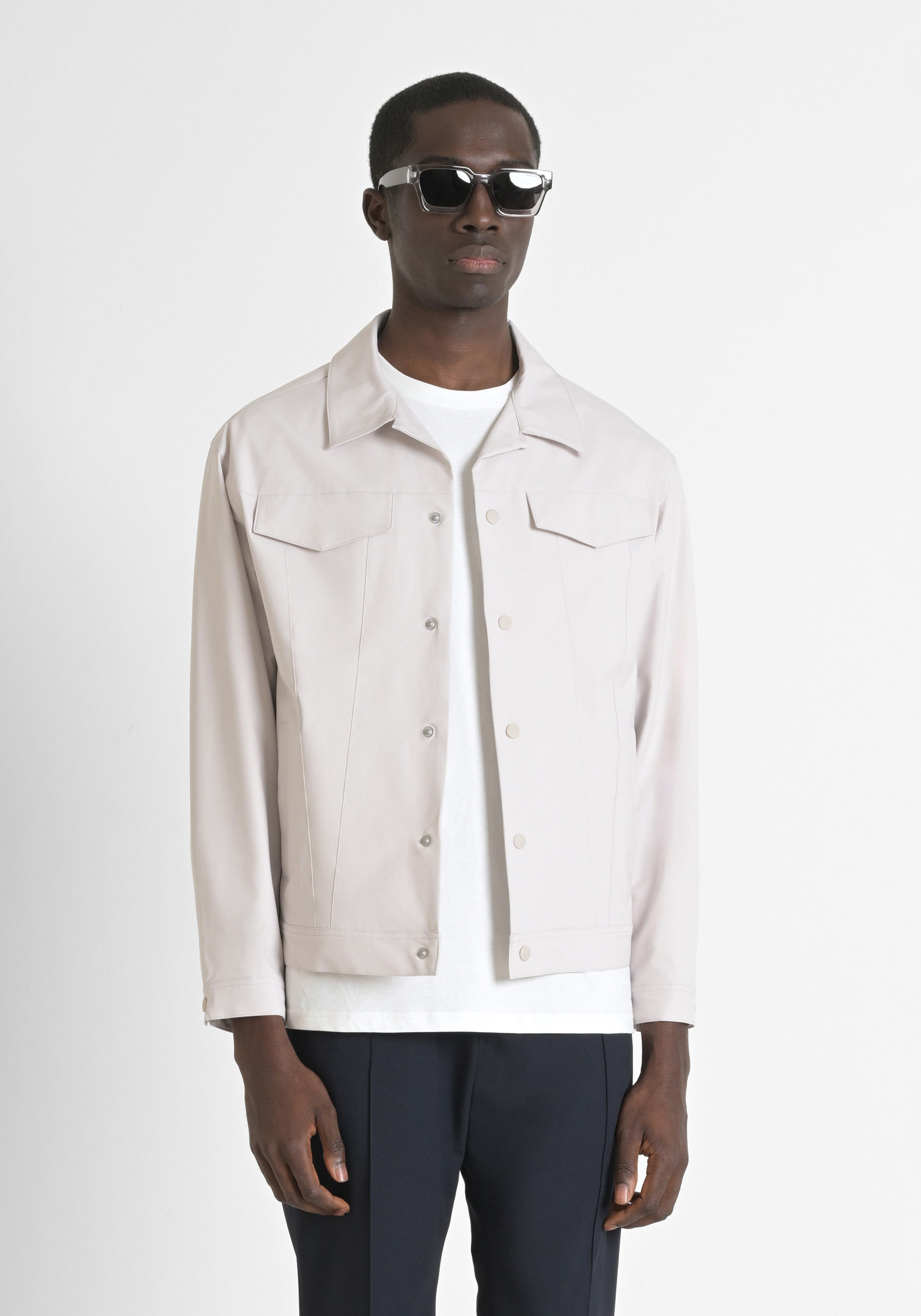 JACKET REGULAR FIT IN TECHNO FABRIC WITH METAL LOGO