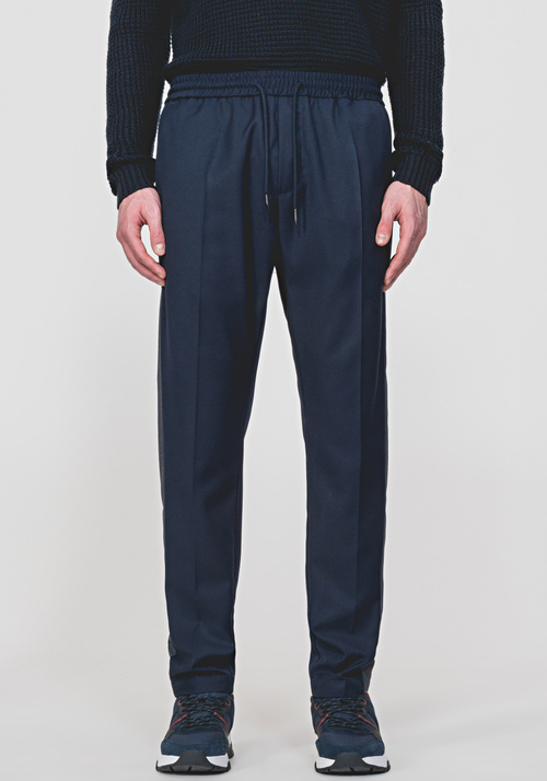 CARROT-FIT TROUSERS MADE OF SOFT-TOUCH BLENDED FABRIC WITH CONTRASTING SIDE BANDS - Trousers | Antony Morato Online Shop