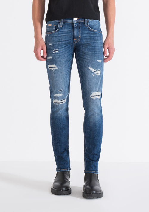 TAPERED FIT "OZZY" JEANS IN VINTAGE-EFFECT BLUE DENIM WITH RIPS - Jeans | Antony Morato Online Shop