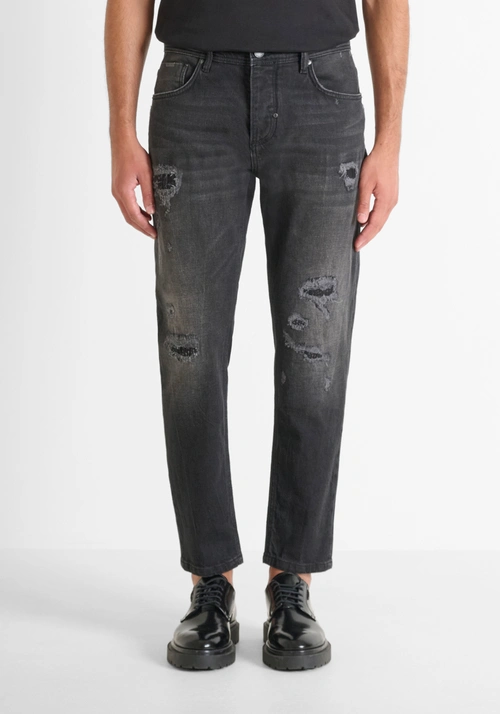 "ARGON" SLIM FIT JEANS ANKLE LENGTH IN BLACK DENIM WITH RIPS - Preview Men's Collection Fall-Winter 2025 | Antony Morato Online Shop