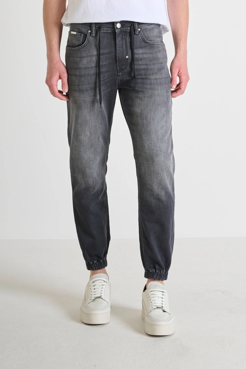"JAKE" CROPPED FIT SKINNY JEANS WITH DÉLAVÉ EFFECT AND DRAWSTRING - Jeans | Antony Morato Online Shop