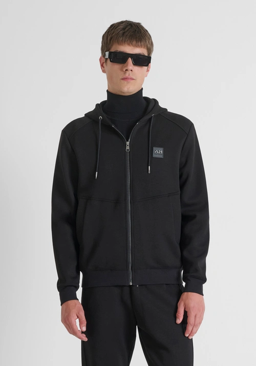 FELPA CON ZIP REGULAR FIT IN TESSUTO ELASTICO E LOGO BADGE GOMMATO - Felpe Uomo | Antony Morato Online Shop