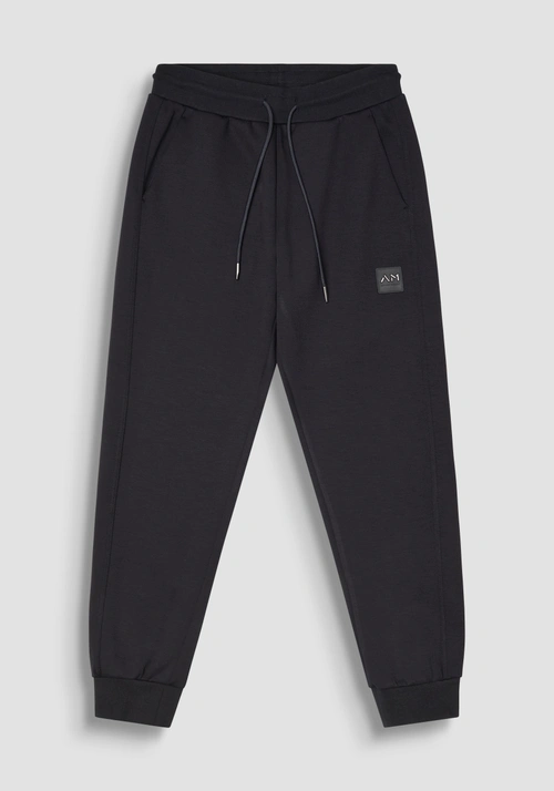 REGULAR FIT VISCOSE BLEND SWEATPANTS WITH RUBBERISED LOGO - Men's Trousers | Antony Morato Online Shop