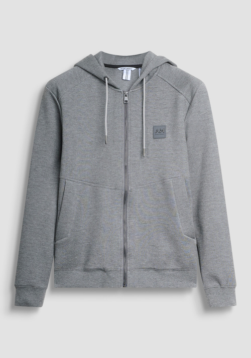 FELPA CON ZIP REGULAR FIT IN TESSUTO ELASTICO E LOGO BADGE GOMMATO - Felpe Uomo | Antony Morato Online Shop