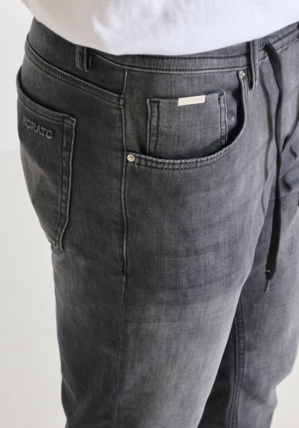 "JAKE" CROPPED FIT SKINNY JEANS WITH DÉLAVÉ EFFECT AND DRAWSTRING - Antony Morato Online Shop