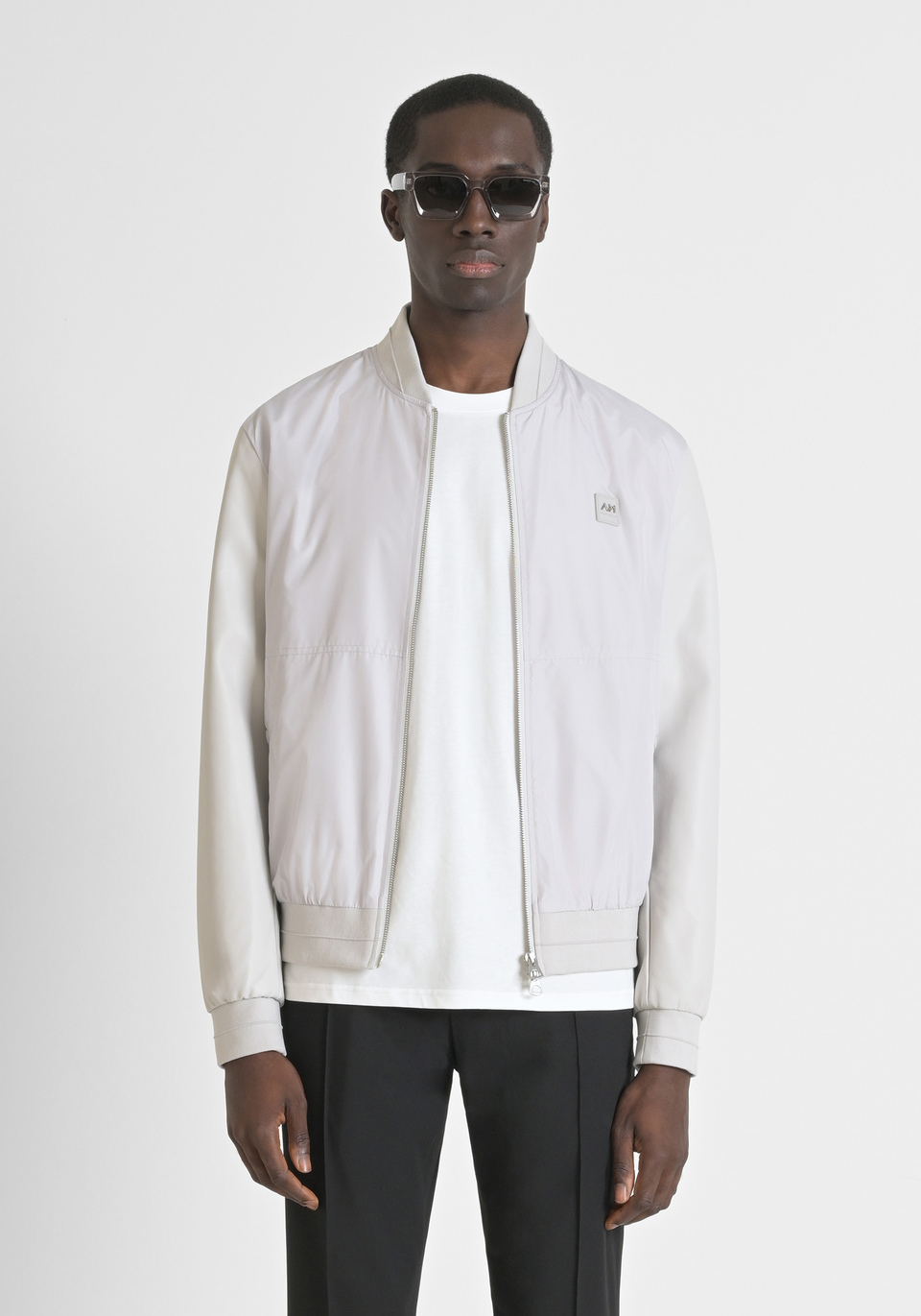 REGULAR FIT JACKET IN TECHNICAL FABRIC WITH FAUX LEATHER SLEEVES AND LOGO PATCH - Antony Morato Online Shop
