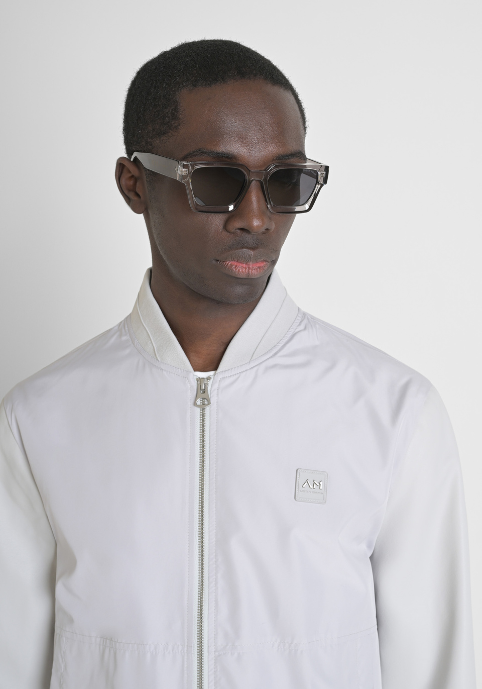REGULAR FIT JACKET IN TECHNICAL FABRIC WITH FAUX LEATHER SLEEVES AND LOGO PATCH - Antony Morato Online Shop