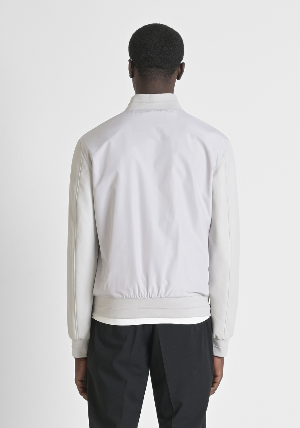 REGULAR FIT JACKET IN TECHNICAL FABRIC WITH FAUX LEATHER SLEEVES AND LOGO PATCH - Antony Morato Online Shop